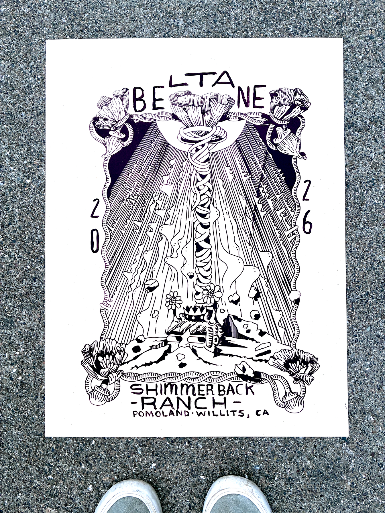 The complete Shimmerback Ranch Beltane print displayed on the ground in Pomoland near Willits, California
